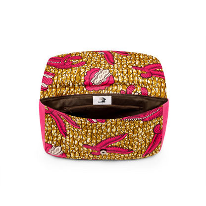 Front opened profile of the Mahalia clutch bag with a African Printed fabric, Pink bubble gum coloured leather, brown cotton  lining .